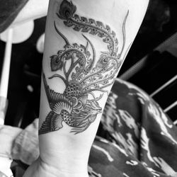 Mercy Tattoo - Phoenix cover up done by Mina. Moon tattoo above is NOT done by Mercy.