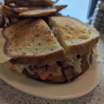 Chutzpah Deli - Reuben ( Corned Beef, Sauerkraut, Swiss Cheese, Russian Dressing ) - Delis Near Me - Fairfax, Virginia Chutzpah Deli - Reuben ( Corned Beef, Sauerkraut, Swiss Cheese, Russian Dressing ) - Delis Near Me - Fairfax, Virginia