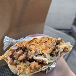 Que Rico Nightclub - Steak super burrito with fried beans