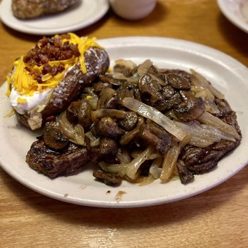 Texas Roadhouse - Ft. Worth Ribeye smothered with onions/mushrooms & a loaded baked potato - Steakhouses Near Me - Menifee, California