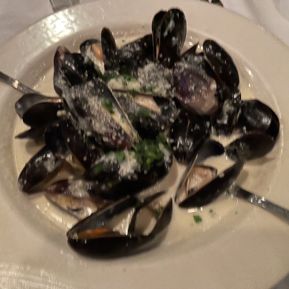 Cafe Tiramisu - Mussels in white wine garlic cream sauce - Italian Near Me - Raleigh, North Carolina Cafe Tiramisu - Mussels in white wine garlic cream sauce - Italian Near Me - Raleigh, North Carolina