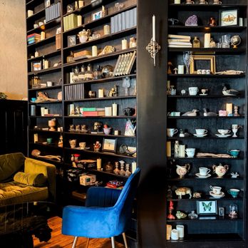 Thistle & Thorne - Floor to ceiling bookshelves in the back of the room - Breakfast & Brunch Near Me - Panama City, Florida Thistle & Thorne - Floor to ceiling bookshelves in the back of the room - Breakfast & Brunch Near Me - Panama City, Florida
