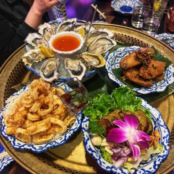 LaoTable - Happy hour platter. Calamari. Oysters. Lao Sausage. Garlic chicken wings. - Laotian Near Me - San Francisco, California