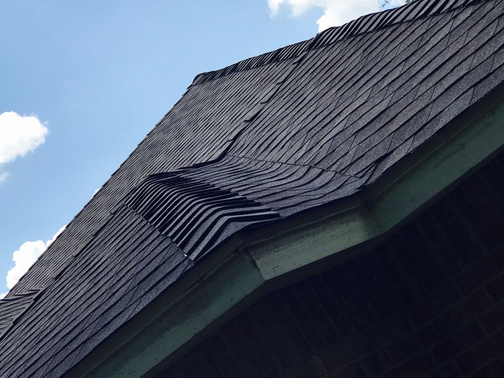 Slide of Titan Roofing