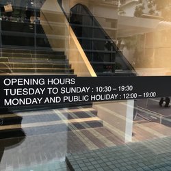Prada - December 2017 posted hours on front door