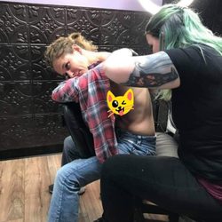 Big Guns Tattoo - Upper back tattoo