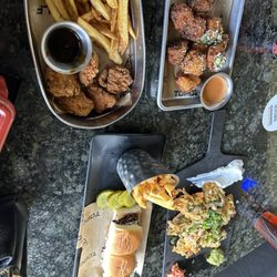 Boneless wings, Macaroni bites, chicken nachos, and BBQ brisket sliders