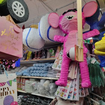 Dulcerias Aztecas - a pink pinata in a store - Party Supplies Near Me - Escondido, California Dulcerias Aztecas - a pink pinata in a store - Party Supplies Near Me - Escondido, California