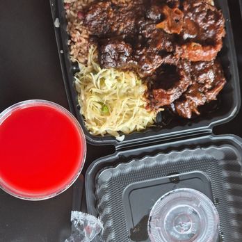 Caribbean Starr Restaurant - Large oxtail and caribbean fruit punch - Caribbean Near Me - New York, New York