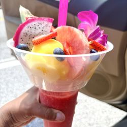 The Smoothie Garden - Combo smoothie strawberry banana, pineapple and flavor, passionfruit and pineapple water ice with fresh fruit on top