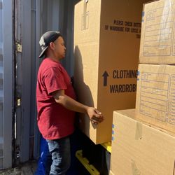 Sunny Movers & Storage - Loading a storage container