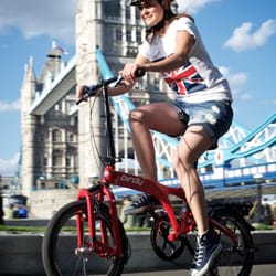 Urban Bike Fitters - Birdy Standard 9-speed full-suspension folding bike in red.