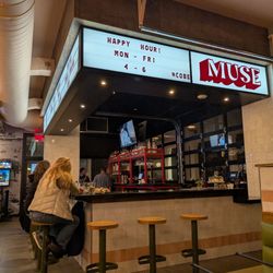 Muse Pizzeria & Arcade - Bar area with happy hour