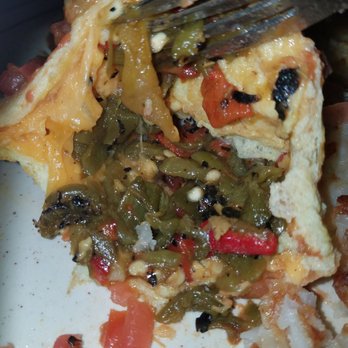 Frontier - Inside the folded omelette filled from side to side with roasted New Mexican Green Chile - Mexican Near Me - Albuquerque, New Mexico Frontier - Inside the folded omelette filled from side to side with roasted New Mexican Green Chile - Mexican Near Me - Albuquerque, New Mexico
