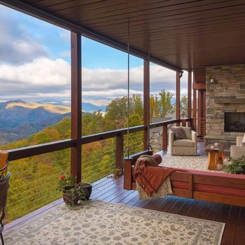 Sineath Construction - Mountainside lodge custom build porch with a view. - General Contractors Near Me - Weaverville, North Carolina