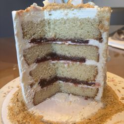 Champagne icing, and raspberry filling