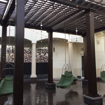 Eau Spa - outdoor swinging chairs - Day Spas Near Me - Manalapan, Florida