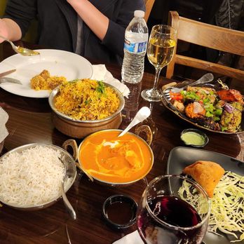 Flames Indian Cuisine - Butter Chicken, Samosa, Lamb Biryani, Tandoori platter, extra rice, garlic naan. - Indian Near Me - Tampa, Florida Flames Indian Cuisine - Butter Chicken, Samosa, Lamb Biryani, Tandoori platter, extra rice, garlic naan. - Indian Near Me - Tampa, Florida