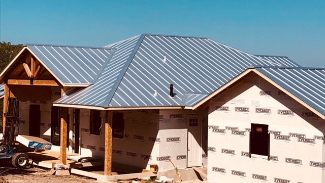 Slide of Tomlin Roofing Professionals