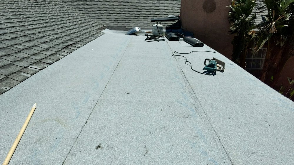 Slide of Magic Hands Roofing