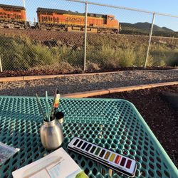 Grand Canyon Railway RV Park - View from one of the back in sites. Train goes by every so often