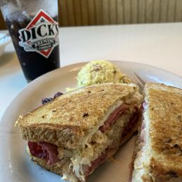 Rueben with house made potato salad and fresh brewed root beer. Rueben with house made potato salad and fresh brewed root beer.