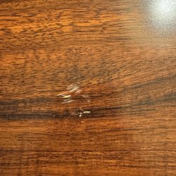 Comfort Inn - Scratches on the table...