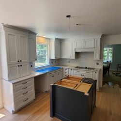 Custom kitchen remodel with gas cooktop and complete appliance and plumbing installation