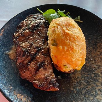 Prime Boji - NY Strip with Twice Baked Potato - Steakhouses Near Me - Arnolds Park, Iowa
