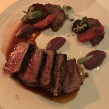Spago - Roasted New York Steak Strip Loin, with Armagnac-Peppercorn Sauce - New American Near Me - Beverly Hills, California Spago - Roasted New York Steak Strip Loin, with Armagnac-Peppercorn Sauce - New American Near Me - Beverly Hills, California