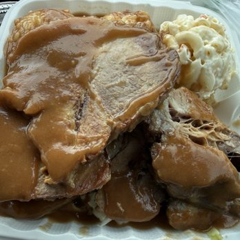 Lucky Box Restaurant - Roast Pork special $11.99 with extra gravy on rice...moved the top piece to see the other 5 pieces - Chinese Near Me - Honolulu, Hawaii Lucky Box Restaurant - Roast Pork special $11.99 with extra gravy on rice...moved the top piece to see the other 5 pieces - Chinese Near Me - Honolulu, Hawaii