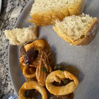 Al'Lupo Ristorante - Enjoyed the sautéed calamari and bread basket of made in house focaccia. Delicious! - Italian Near Me - Cincinnati, Ohio Al'Lupo Ristorante - Enjoyed the sautéed calamari and bread basket of made in house focaccia. Delicious! - Italian Near Me - Cincinnati, Ohio