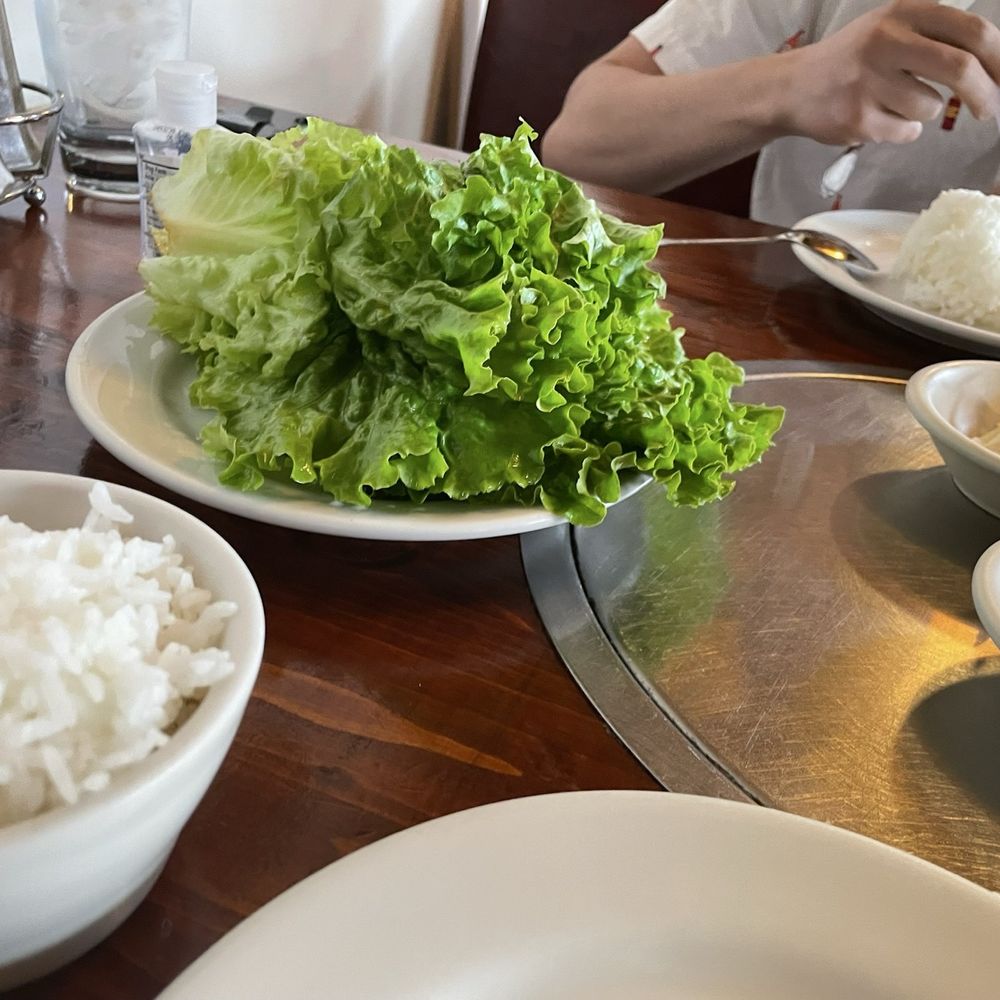 Korea Garden - Lettuce and rice, with a sneak peek of the kimchi - Korean Near Me - Omaha, Nebraska Korea Garden - Lettuce and rice, with a sneak peek of the kimchi - Korean Near Me - Omaha, Nebraska