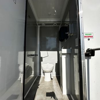 DAK Luxury Restrooms - DAK Luxury Restroom Trailers Fresno 4-Station Interior Restroom 4 - Portable Toilet Services Near Me