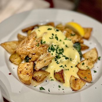 Becks - a plate of potatoes with cheese sauce - Seafood Near Me - Augusta, Georgia