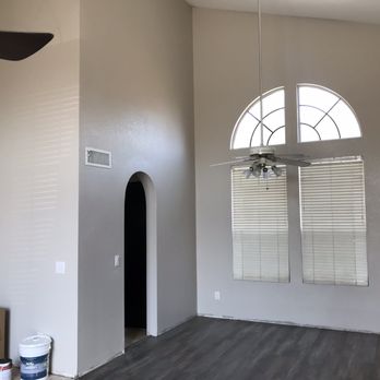 PSS Painting and Drywall - Downstairs room with vaulted ceiling painted from dark gray to light beige (baseboards will still be put along the floor). - Painters Near Me - Phoenix, Arizona PSS Painting and Drywall - Downstairs room with vaulted ceiling painted from dark gray to light beige (baseboards will still be put along the floor). - Painters Near Me - Phoenix, Arizona