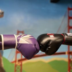 Bay Breakers Boxing Gym - The owners touch gloves in front of our mural!