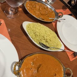 Butter Chicken ( Left ) Rice ( middle ) Chicken Tikka Masala ( Right ) Butter Chicken ( Left ) Rice ( middle ) Chicken Tikka Masala ( Right )