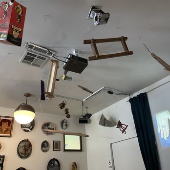 Merchant Roots - Wall of Nonna's and pasta tools hanging from the ceiling - New American Near Me - San Francisco, California Merchant Roots - Wall of Nonna's and pasta tools hanging from the ceiling - New American Near Me - San Francisco, California