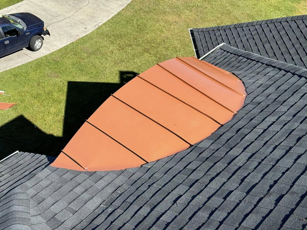 Slide of Archyk Roofing