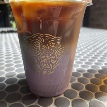 Commissary Barber & Barista - Iced pineapple ube latte with oat milk - Coffee & Tea Near Me - Indianapolis, Indiana