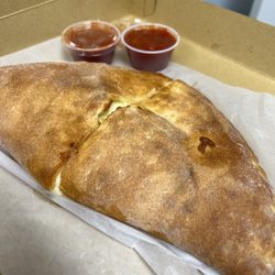 Trapper'S Pizza Pub - Extra mozzarella cheese calzone. GIANT.