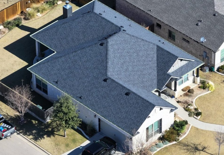 Slide of Green Shield Roofing