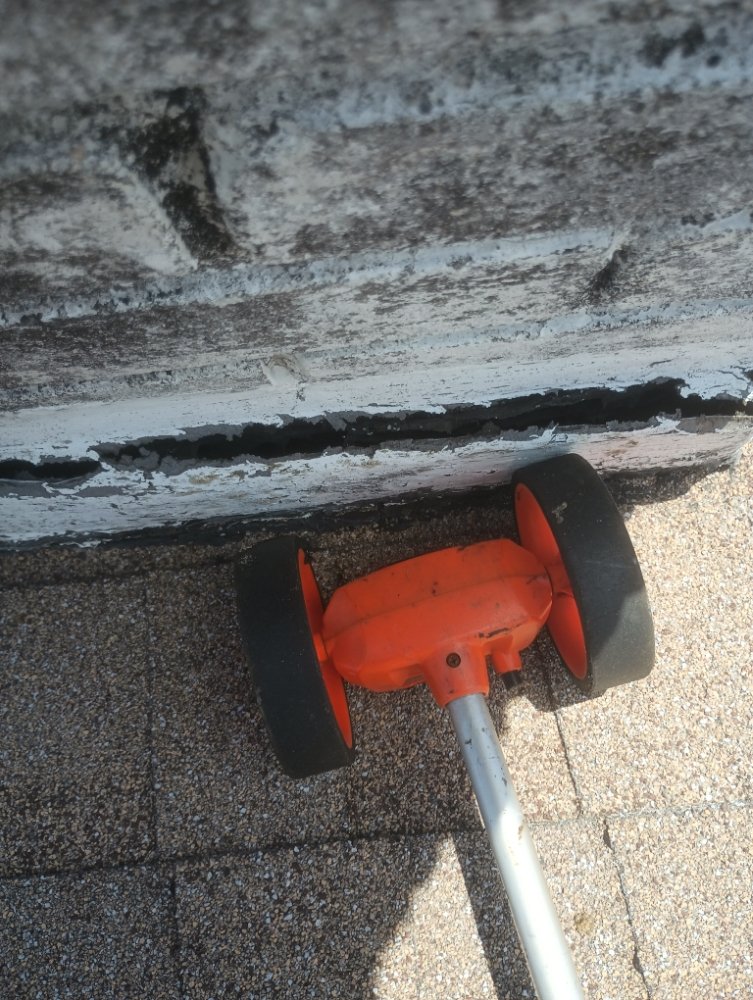 Slide of Keith The Roofer