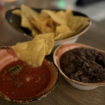 Caló Kitchen + Tequila - Comp chips salsa & bean dip - Cocktail Bars Near Me - Costa Mesa, California Caló Kitchen + Tequila - Comp chips salsa & bean dip - Cocktail Bars Near Me - Costa Mesa, California