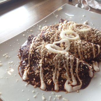 Copal Progressive Mexican Cuisine - LAS DE MOLE Our famous homemade mole sauce, prepared with over 15 ingredients resulting in a truly Mexican dish, served with Cotija Cheese, - Mexican Near Me - Lincoln, Nebraska Copal Progressive Mexican Cuisine - LAS DE MOLE Our famous homemade mole sauce, prepared with over 15 ingredients resulting in a truly Mexican dish, served with Cotija Cheese, - Mexican Near Me - Lincoln, Nebraska