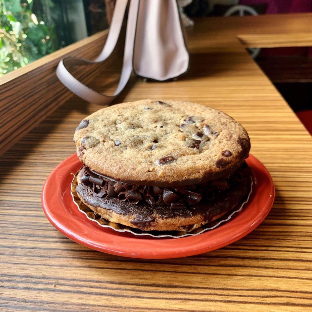 Piece, Love and Chocolate - Chocolate chip cookie sandwich with chocolate mousse - Chocolatiers & Shops Near Me - Boulder, Colorado Piece, Love and Chocolate - Chocolate chip cookie sandwich with chocolate mousse - Chocolatiers & Shops Near Me - Boulder, Colorado