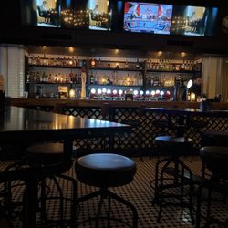 S+L Kitchen & Bar Langley - Seating area with a view of the bar.