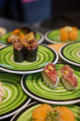 Kura Revolving Sushi Bar by null