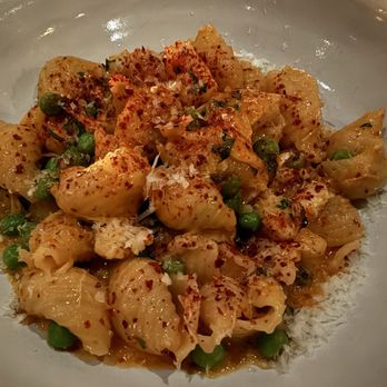 Lowland Tavern - SHELLS & SEAFOOD RAGU - rock shrimp, lump crab, parmesan - New American Near Me - Charleston, South Carolina Lowland Tavern - SHELLS & SEAFOOD RAGU - rock shrimp, lump crab, parmesan - New American Near Me - Charleston, South Carolina